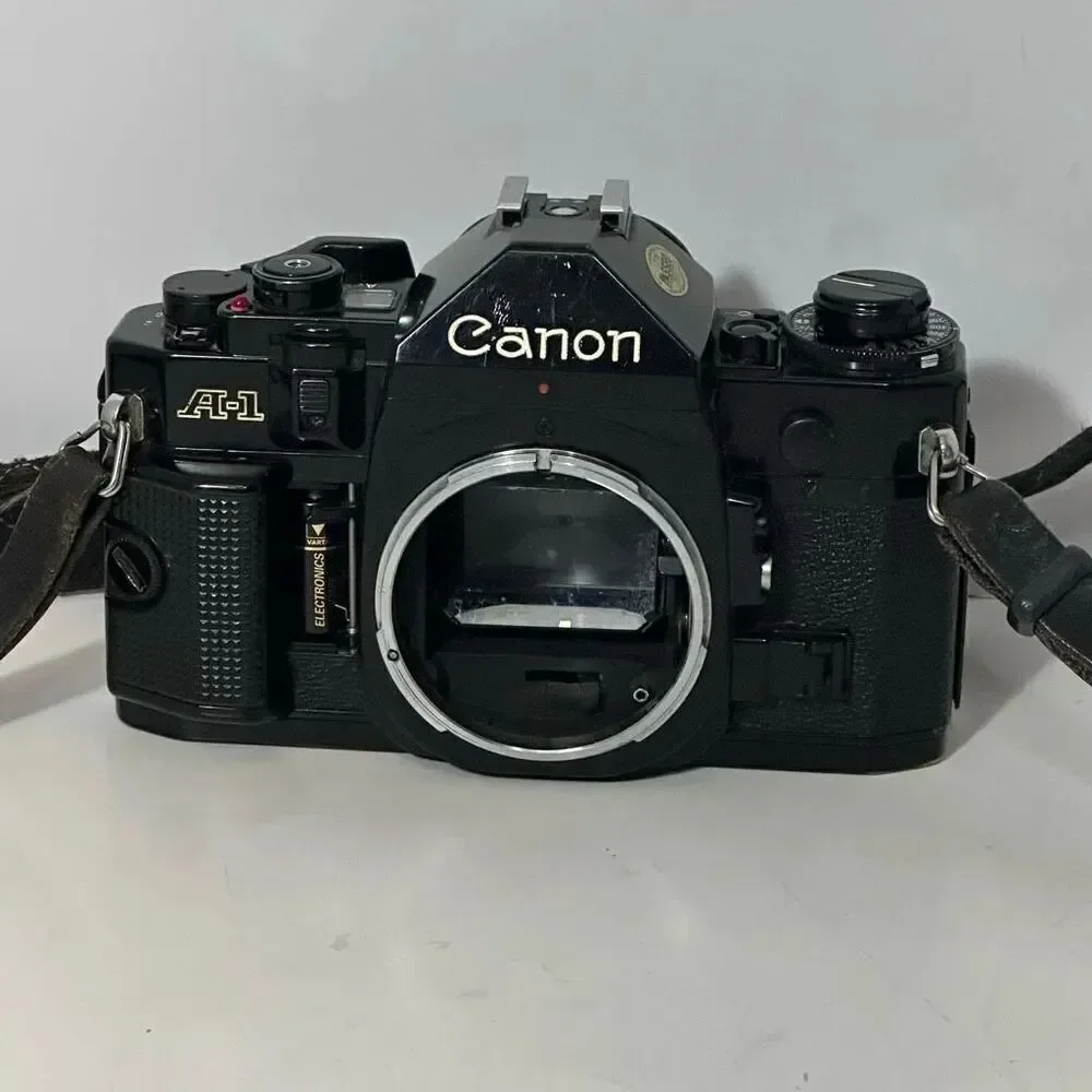 Vintage Canon A-1 Black 35 mm SLR with Strap/ Body Only